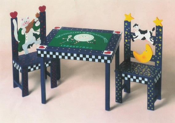 CHILD'S NURSERY RHYME TABLE AND CHAIRS